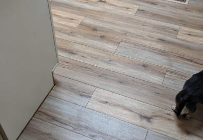 a picture of the hardwood floor we installed in an existing home in Lanagan MO