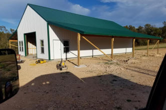 a picture of a custom barn we built in Powell MO